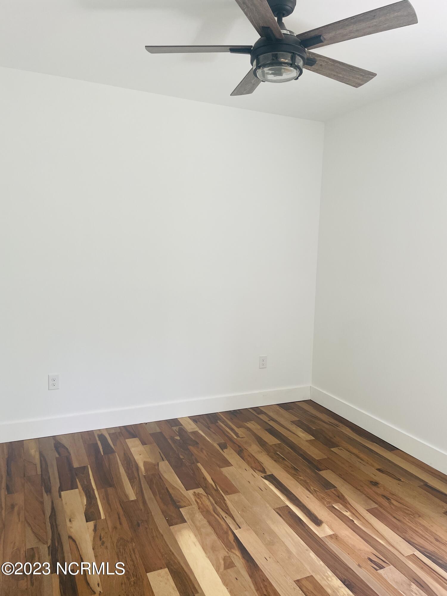 213 Sanders Street Tabor City, NC 28463 - Photo 12 of 25 Enjoy a remote controlled ceiling fan.
