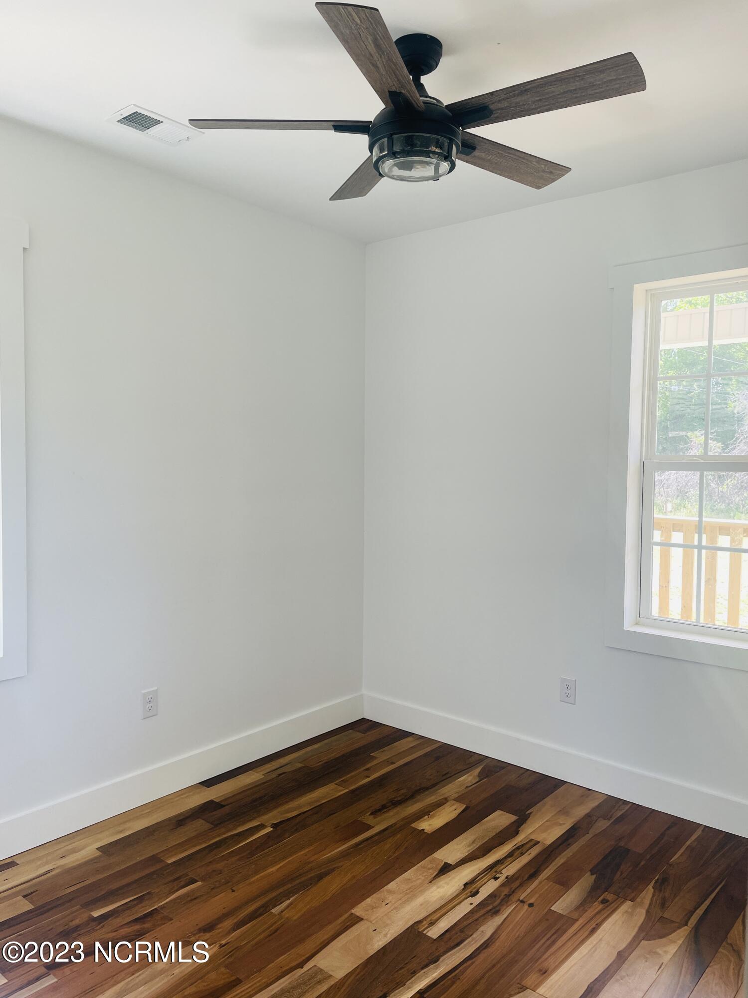 213 Sanders Street Tabor City, NC 28463 - Photo 18 of 25 Coastal grade windows will add lots of natural lighting to your new home!