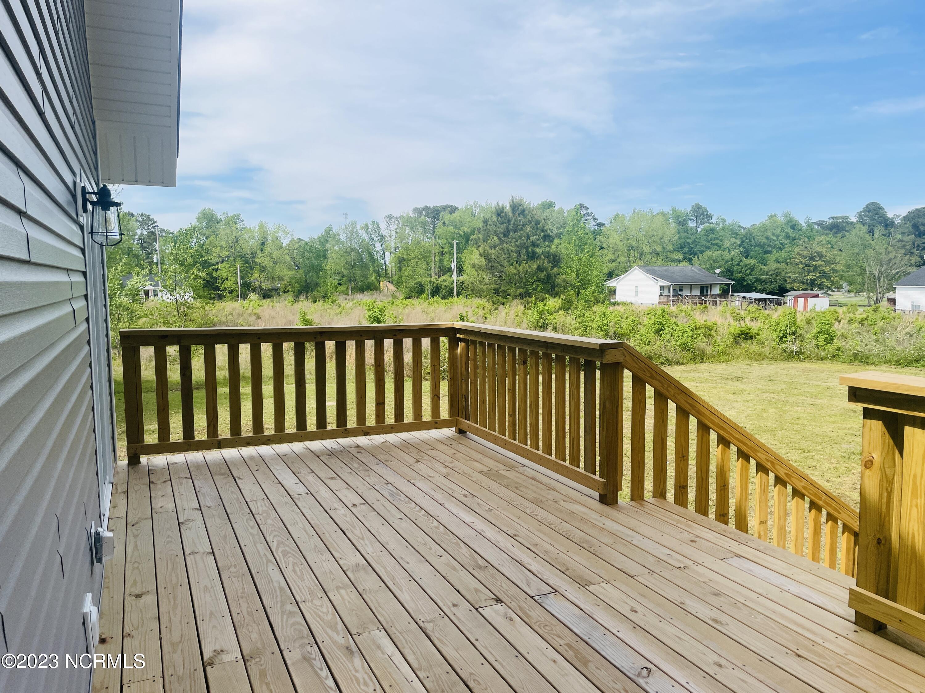 213 Sanders Street Tabor City, NC 28463 - Photo 20 of 25 Enjoy this large back deck area.