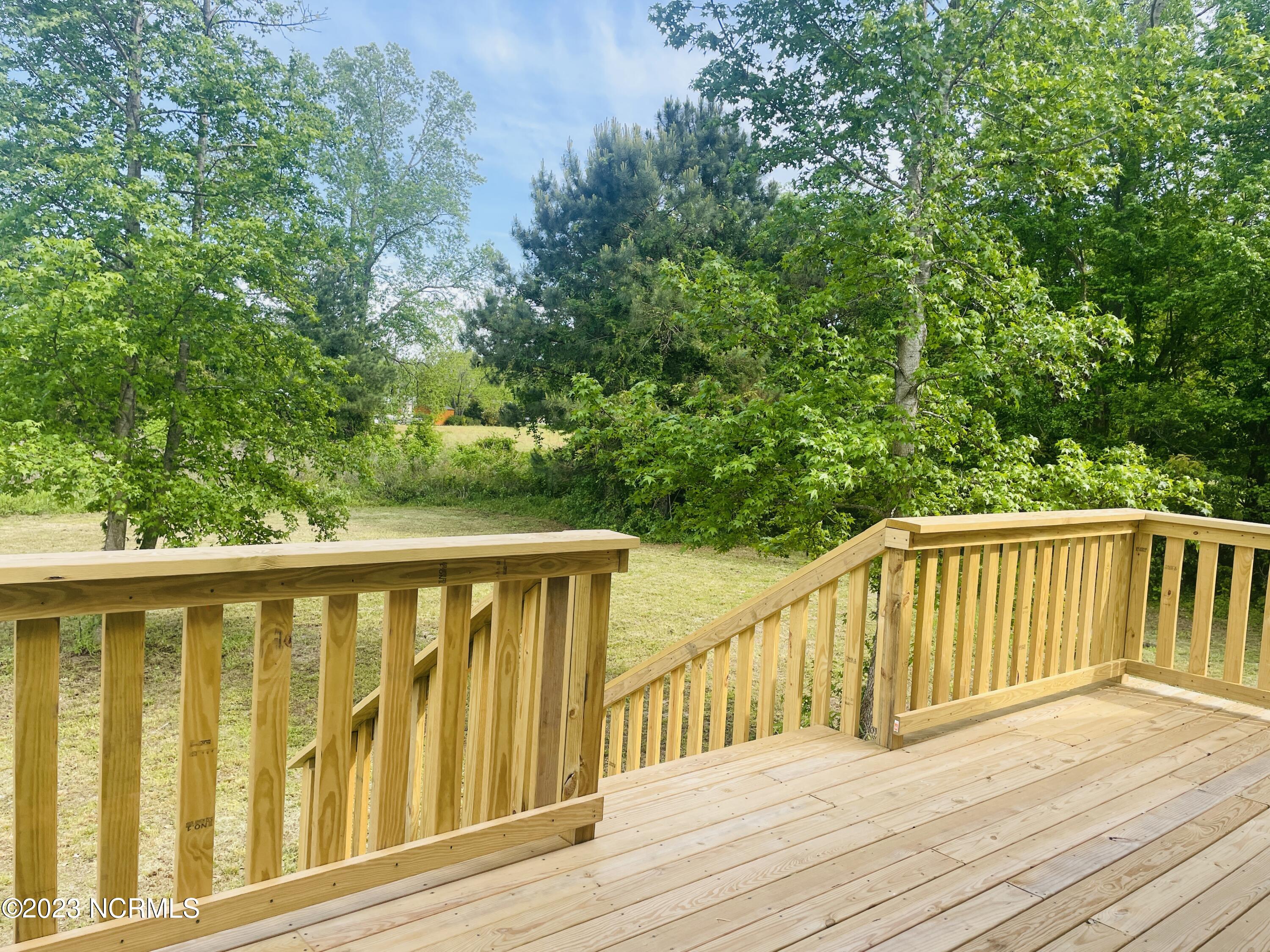 213 Sanders Street Tabor City, NC 28463 - Photo 21 of 25 Grill effortlessly with tons of space, perfect for a backyard BBQ.