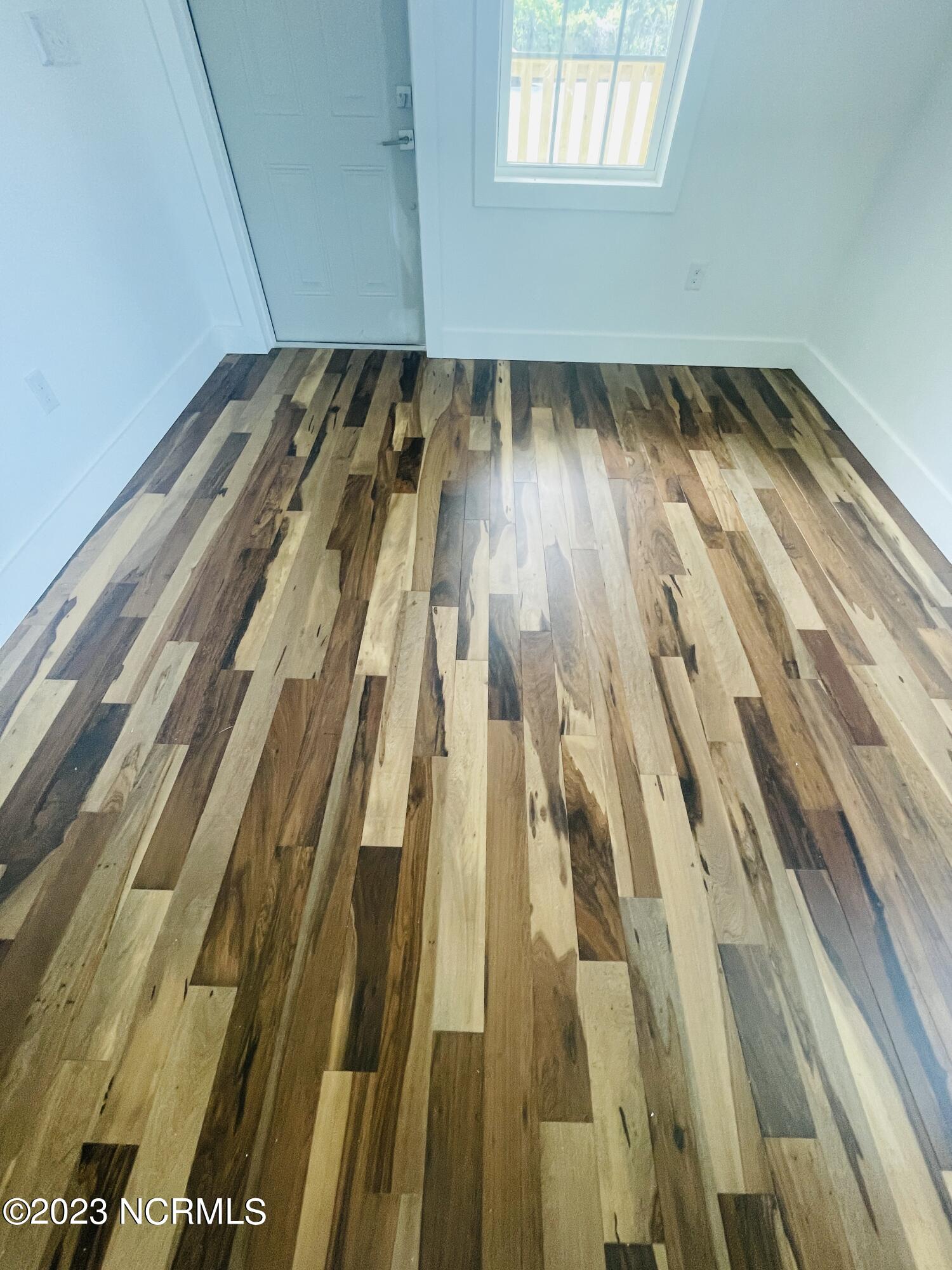 213 Sanders Street Tabor City, NC 28463 - Photo 6 of 25 The Brazilian Pecan wood floors are top of the line.