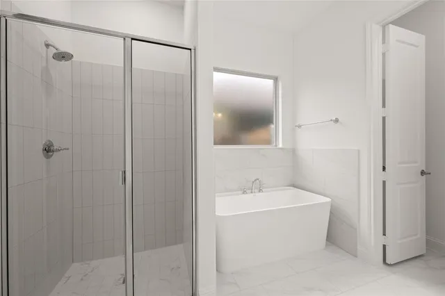 a white room with shower