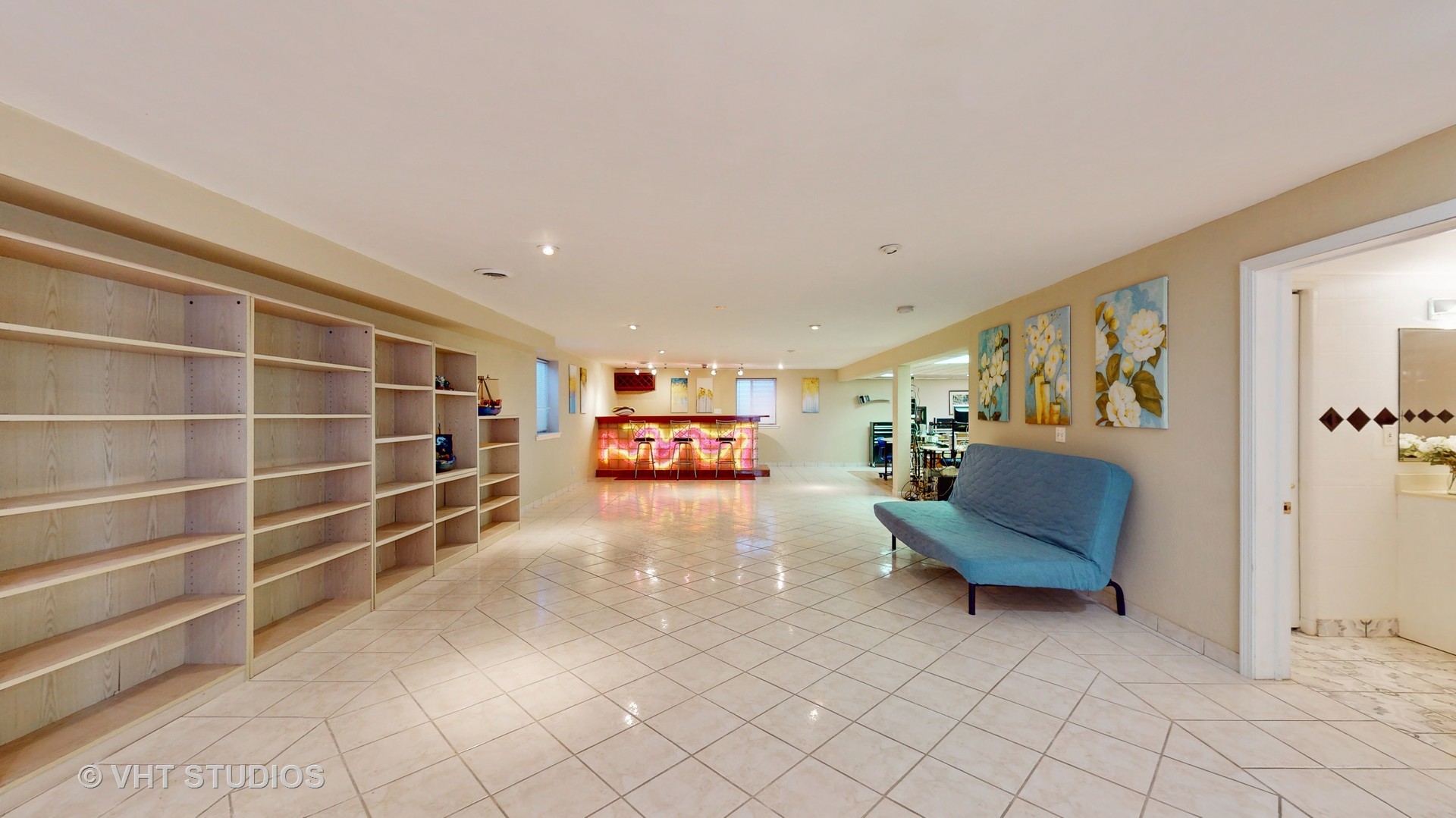 811 Commons Road Naperville, IL 60563 - Photo 38 of 61 a view of a livingroom with furniture and a window