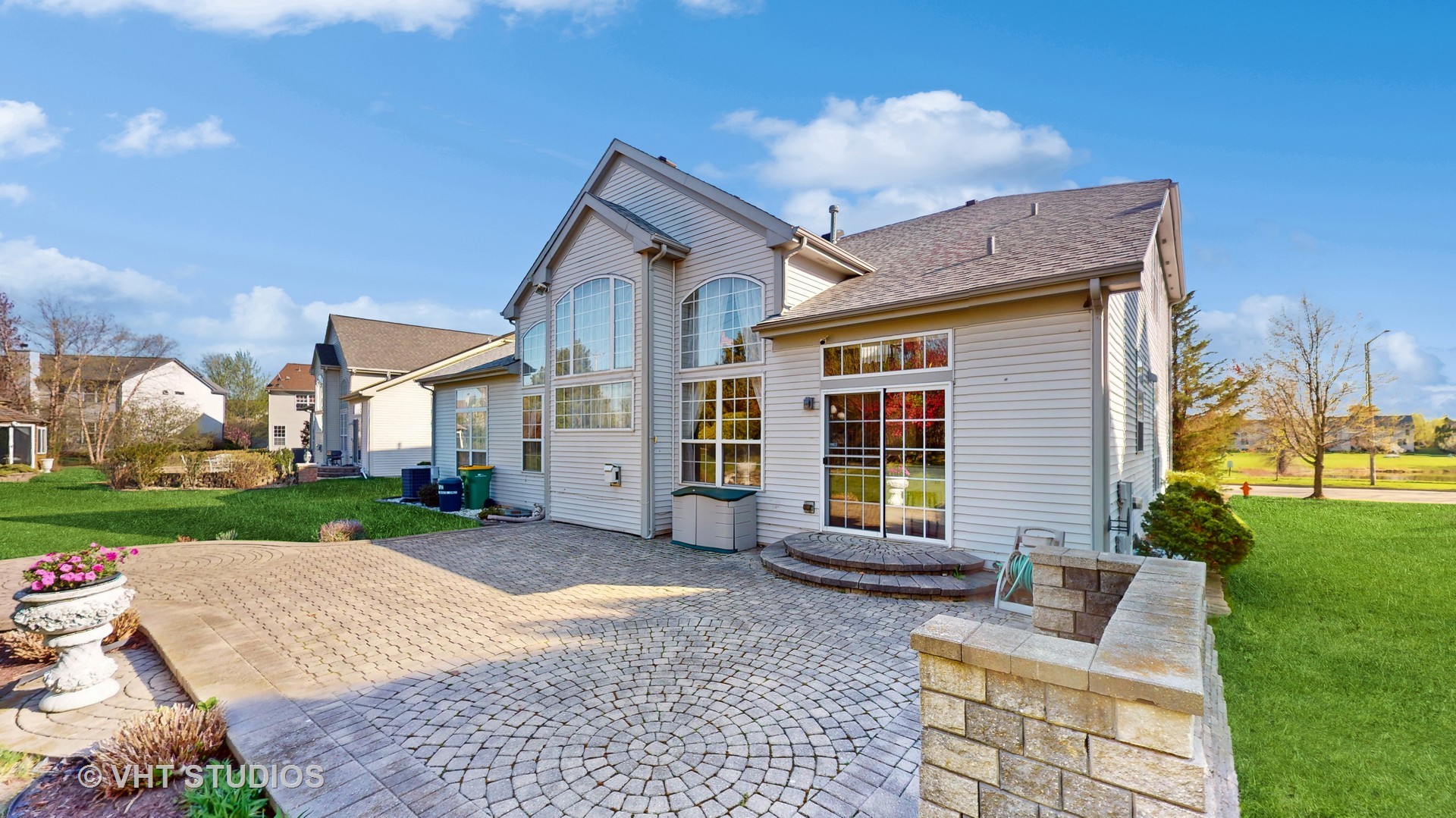 811 Commons Road Naperville, IL 60563 - Photo 50 of 61 a view of house with backyard and outdoor seating