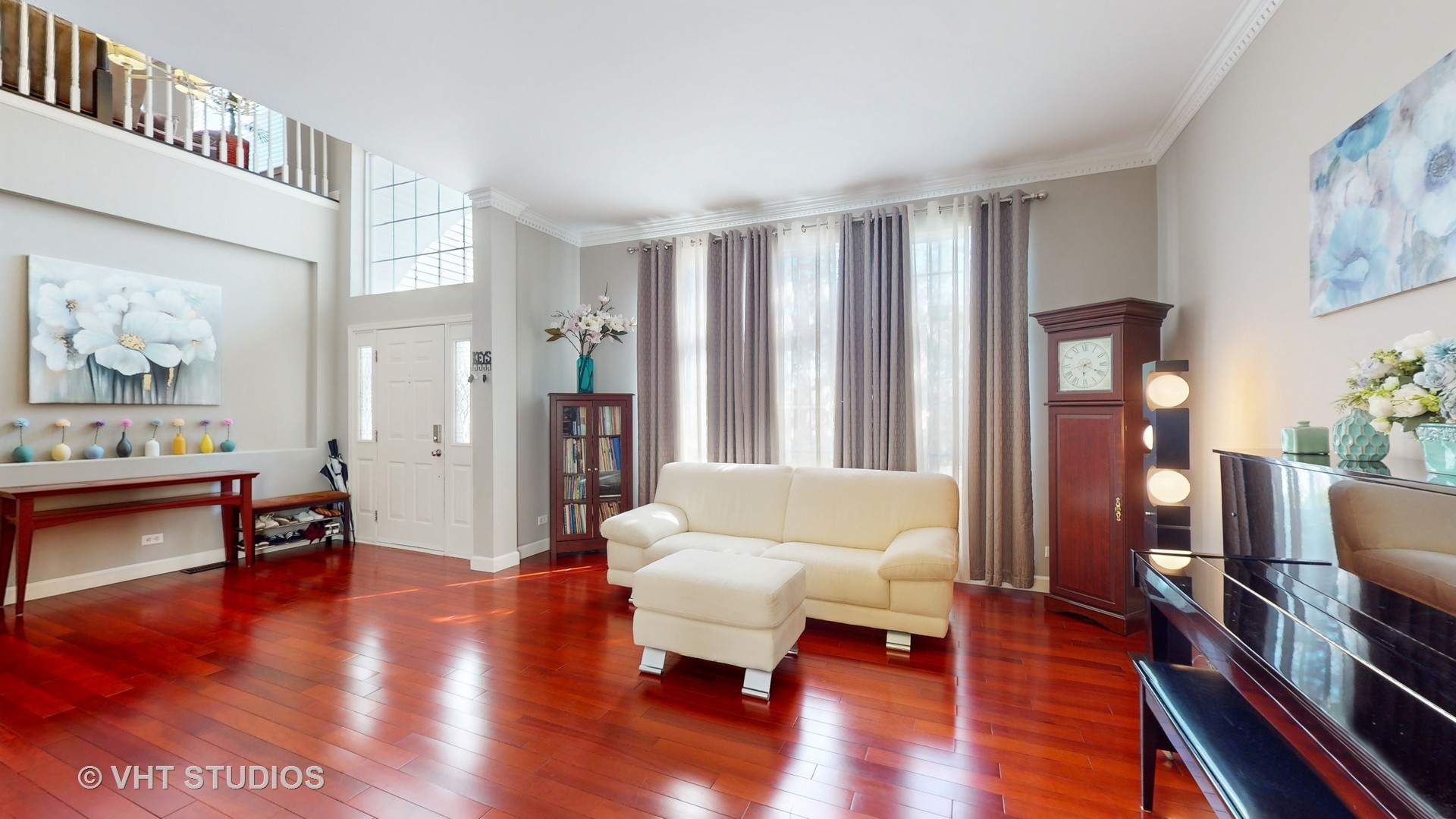 811 Commons Road Naperville, IL 60563 - Photo 5 of 61 a living room with furniture and a wooden floor