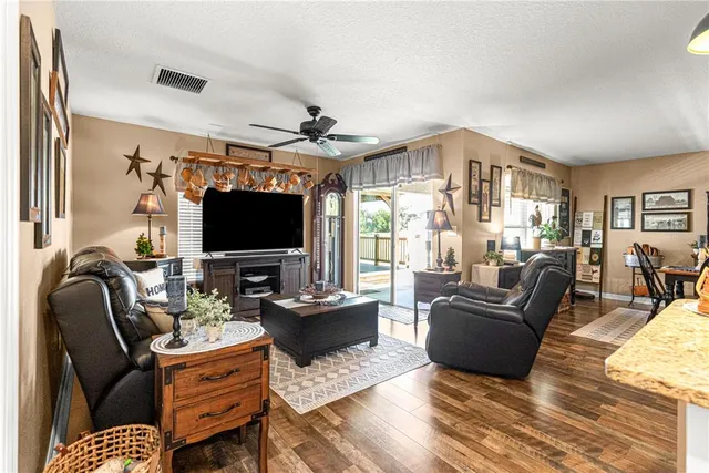 a view of a balcony with wooden floor