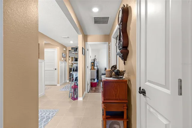 a view of a livingroom with storage & utility room