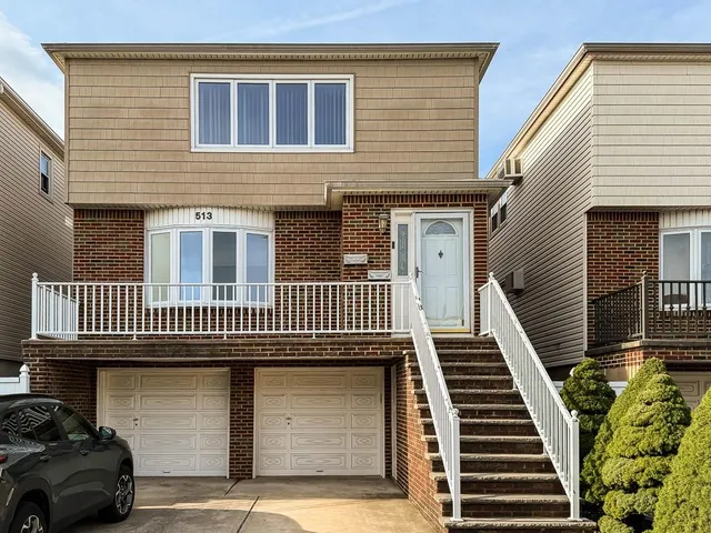 a view of a house with stairs and stairs