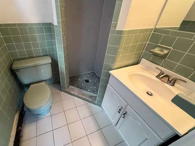 a bathroom with a sink and toilet