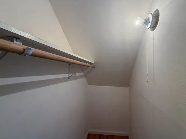 a view of small space with racks on the wall