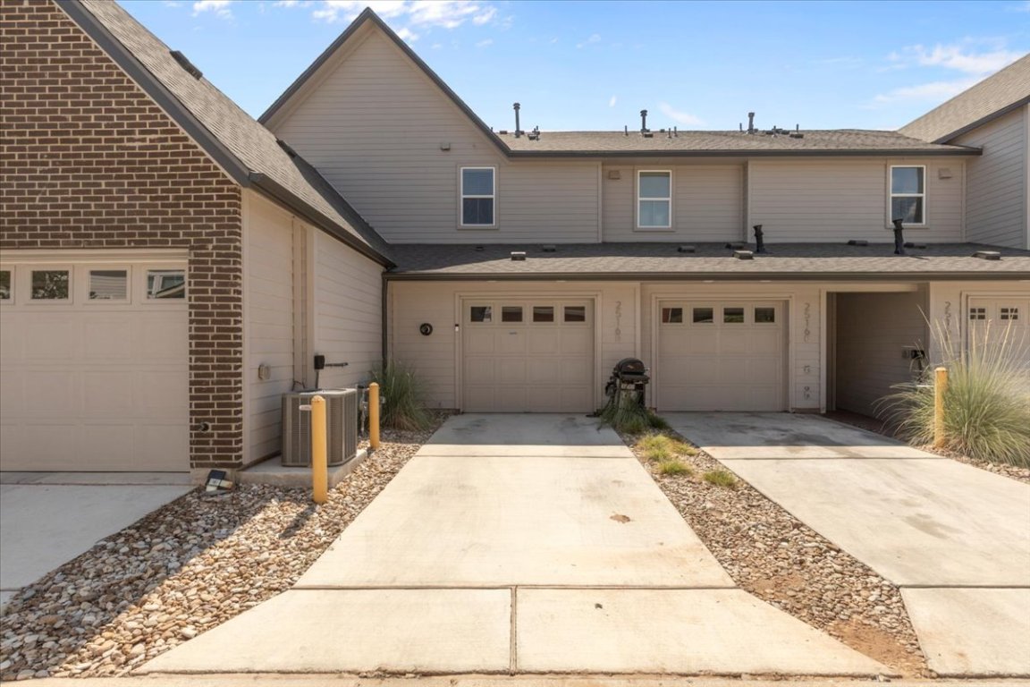2516 Simond Avenue, Unit D Austin, TX 78723 - Photo 24 of 31 View from the back Alle and Garage.