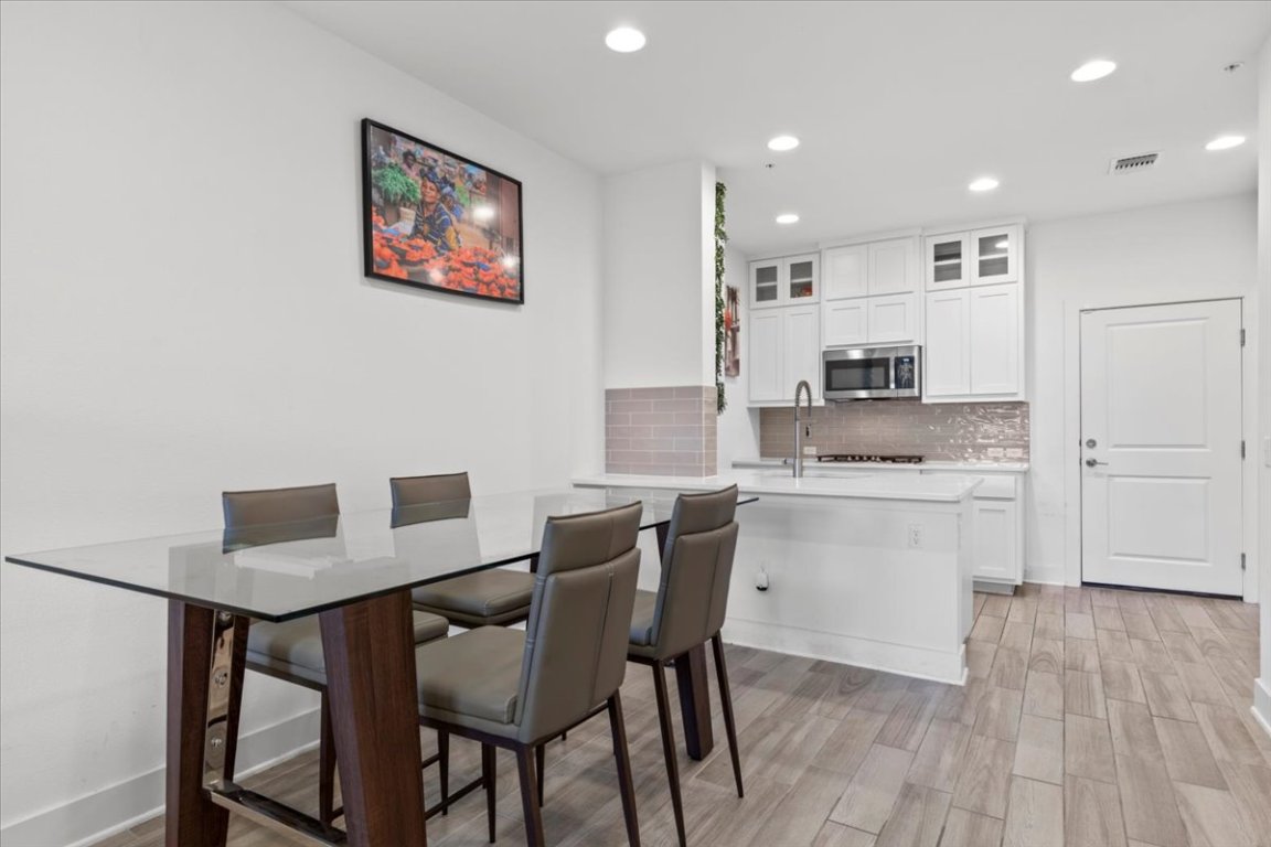 2516 Simond Avenue, Unit D Austin, TX 78723 - Photo 10 of 31 Open floor Dining room