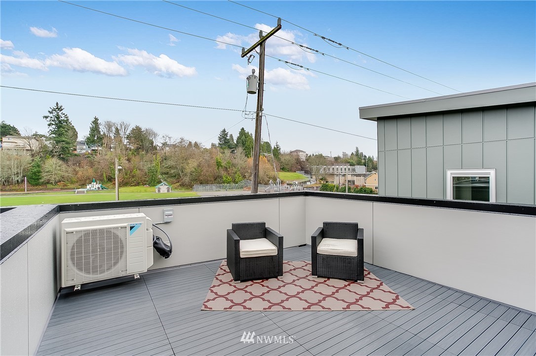 5257 Fauntleroy Way Southwest Seattle, WA 98136 - Photo 25 of 27 a view of balcony with furniture