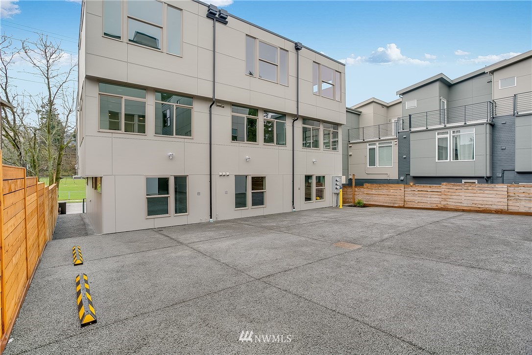 5257 Fauntleroy Way Southwest Seattle, WA 98136 - Photo 26 of 27 a view of a street with buildings