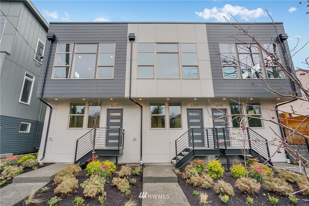 5257 Fauntleroy Way Southwest Seattle, WA 98136 - Photo 27 of 27 a front view of a house with a yard