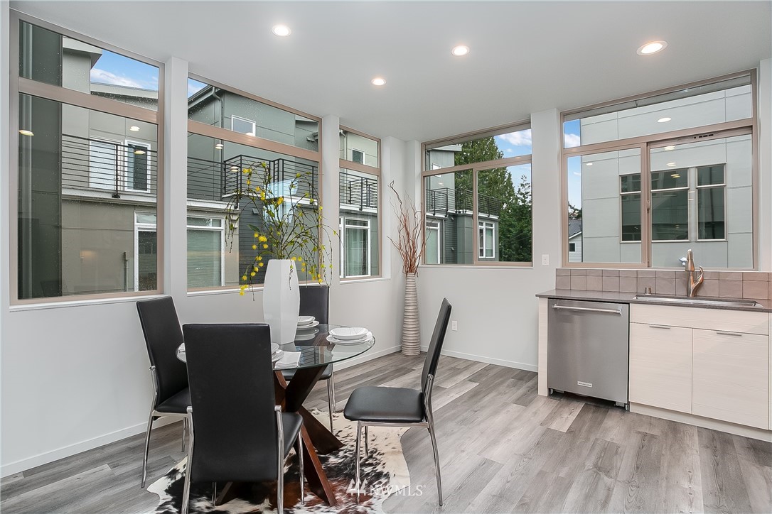 5257 Fauntleroy Way Southwest Seattle, WA 98136 - Photo 8 of 27 a view of a dining room with furniture window and outside view