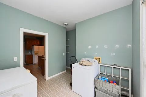 a room with a table and workspace