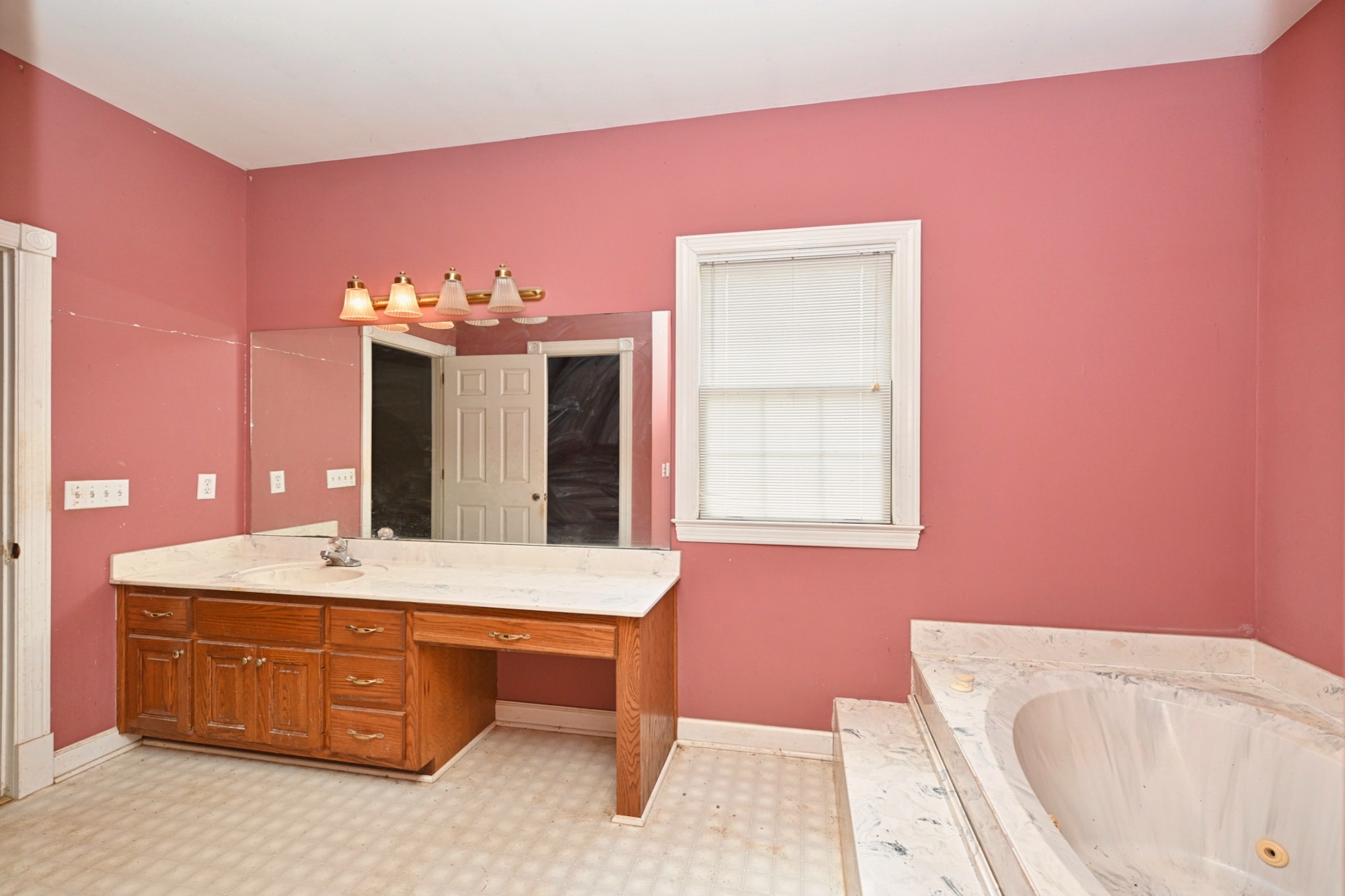795 New Shackle Island Road Hendersonville, TN 37075 - Photo 17 of 41 a bathroom with a tub sink and mirror