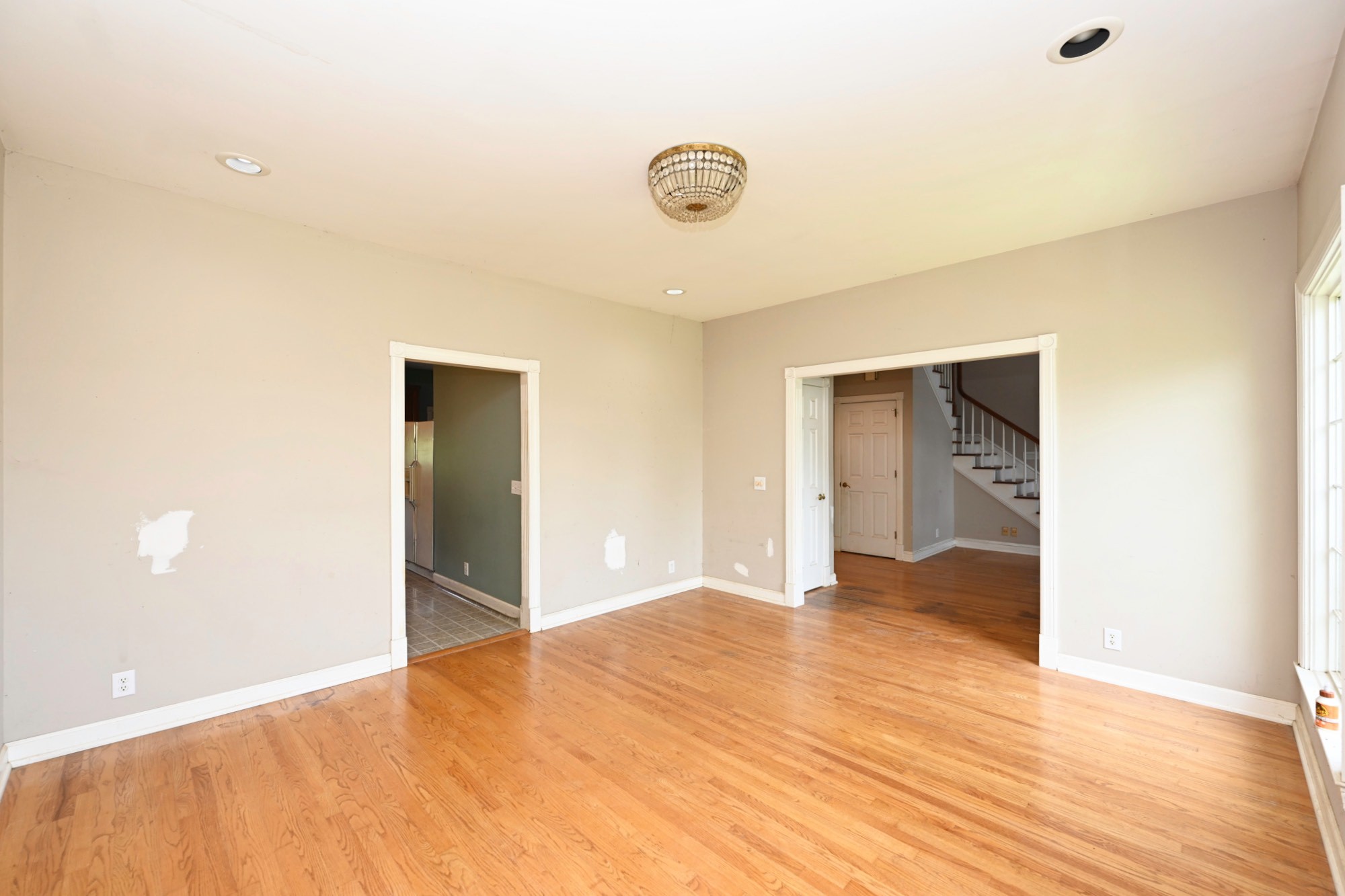 795 New Shackle Island Road Hendersonville, TN 37075 - Photo 18 of 41 a view of empty room with wooden floor