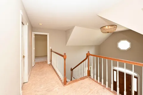 a view of a hallway with entryway