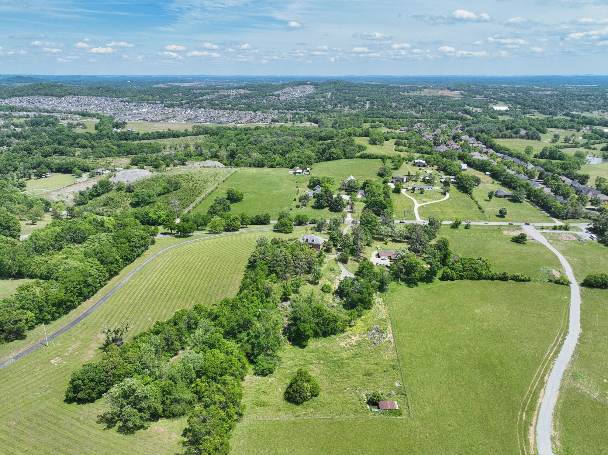 795 New Shackle Island Road Hendersonville, TN 37075 - Photo 37 of 41 an aerial view of a residential houses with outdoor space and trees all around