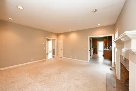 a view of a livingroom with a staircase