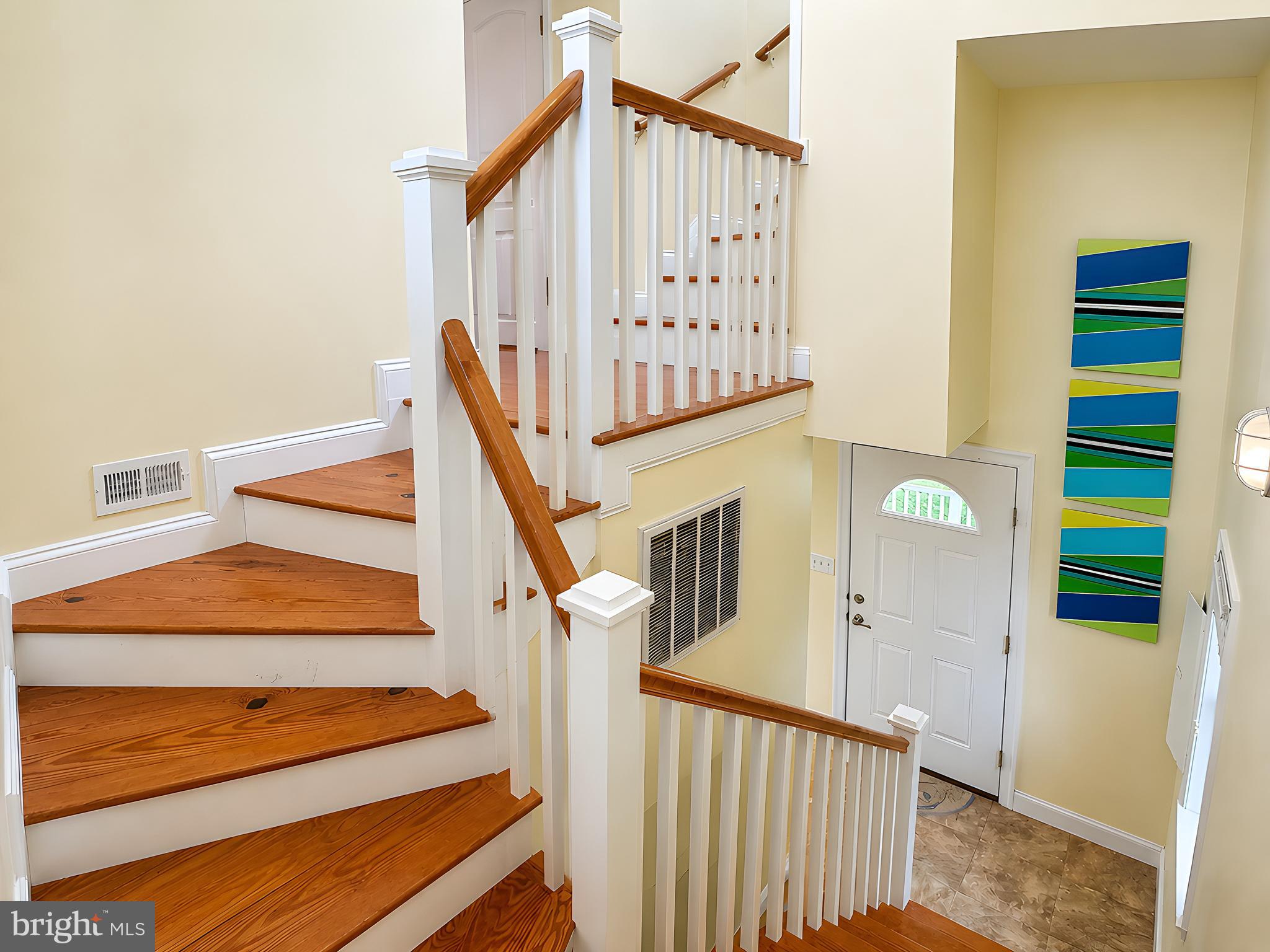 16144 Thomas Road Piney Point, MD 20674 - Photo 44 of 98 Stunning Custom Staircase leading to 2nd Level
