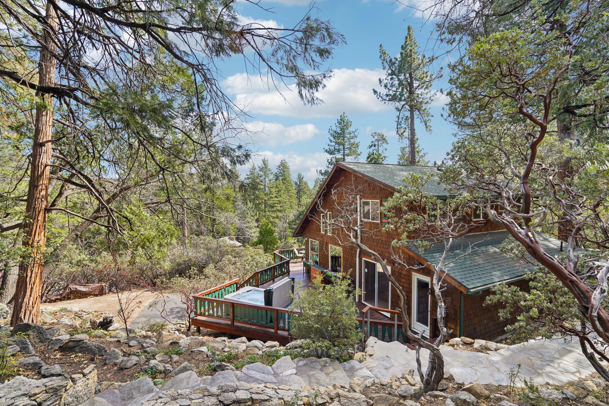25361 Skyline Way Idyllwild, CA 92549 - Photo 1 of 42 a view of houses and snow on the road