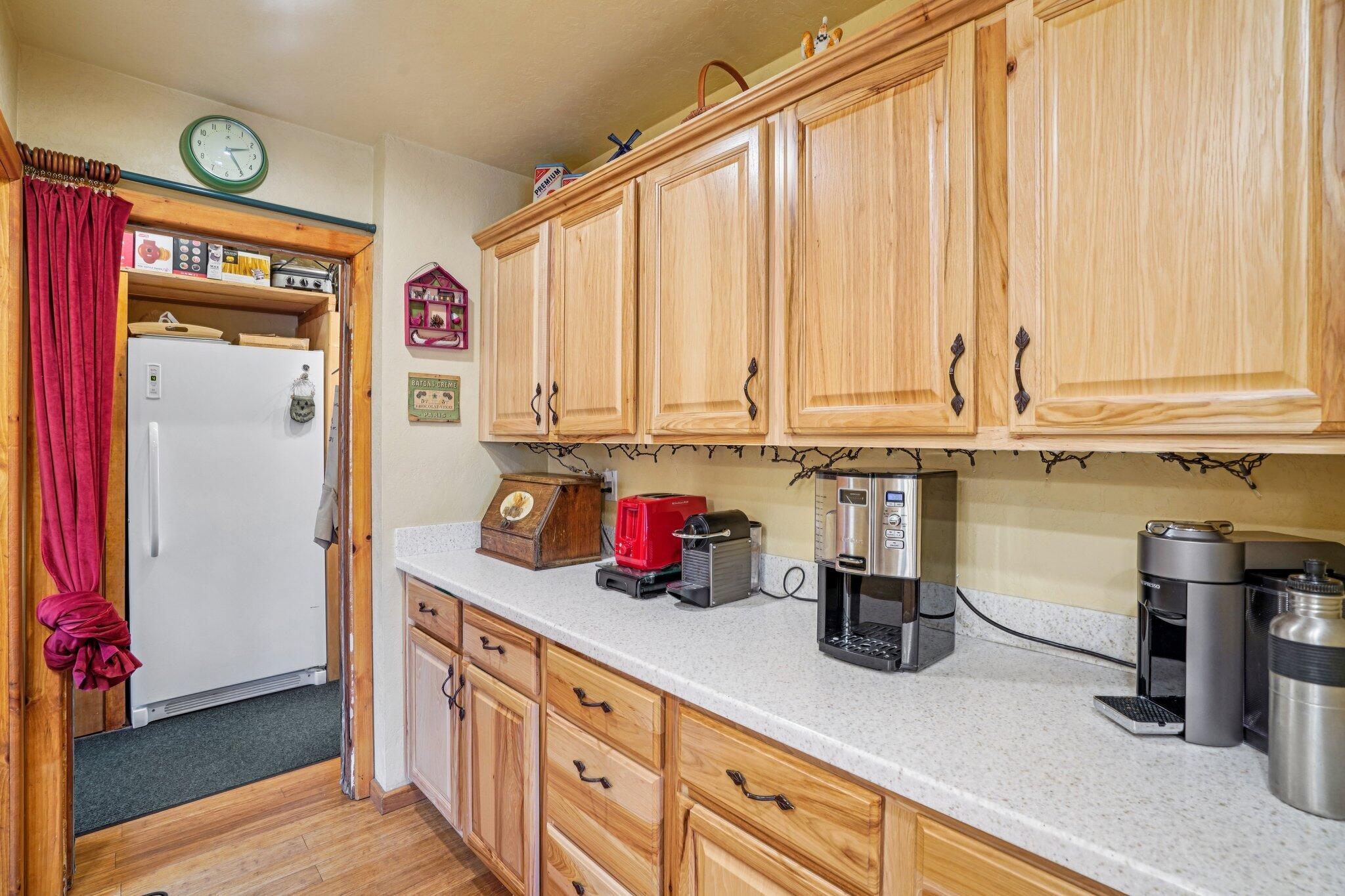 25361 Skyline Way Idyllwild, CA 92549 - Photo 17 of 42 a kitchen with stainless steel appliances granite countertop a sink a stove and cabinets