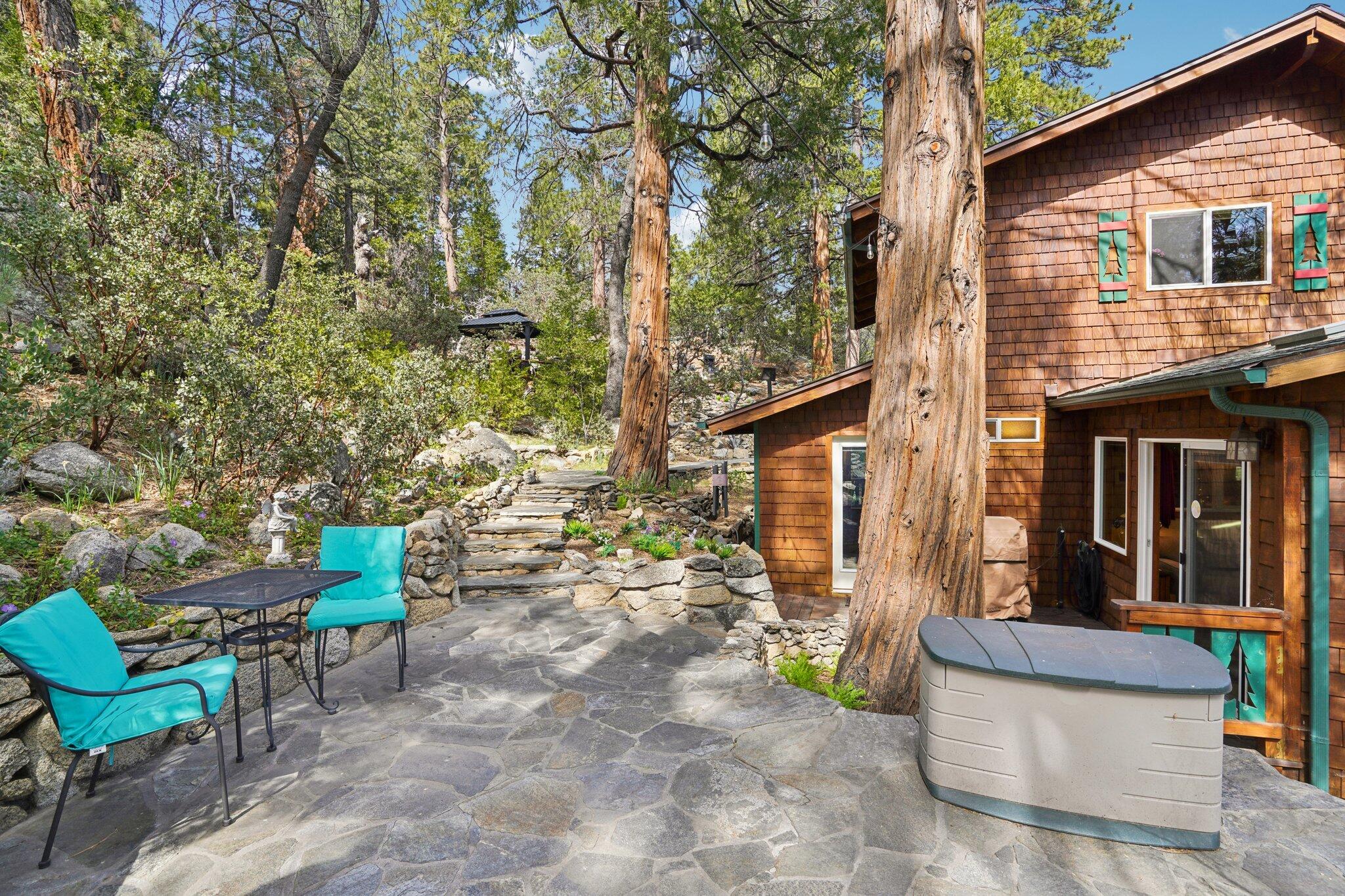25361 Skyline Way Idyllwild, CA 92549 - Photo 34 of 42 a view of a house with backyard and sitting area