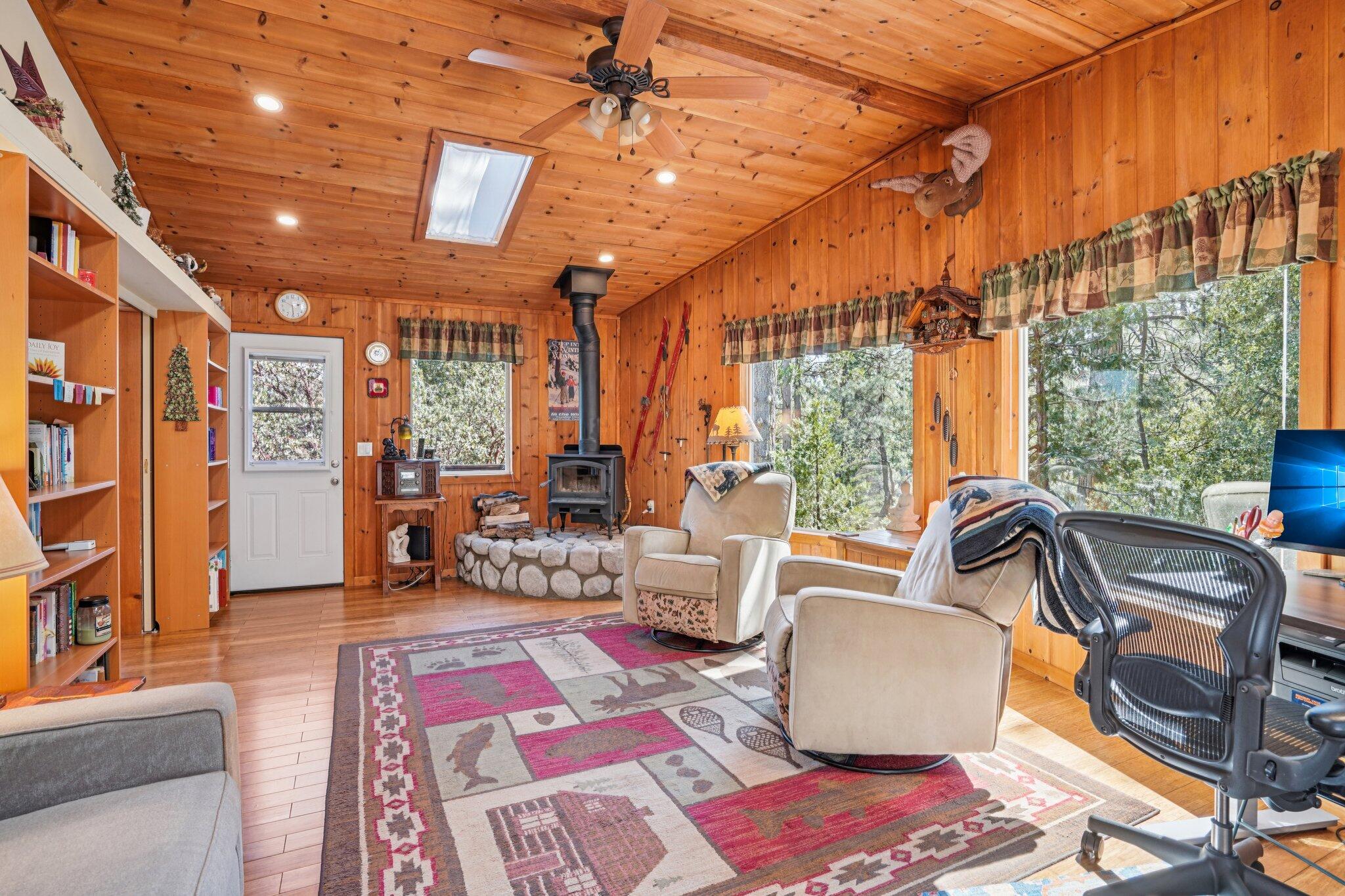 25361 Skyline Way Idyllwild, CA 92549 - Photo 10 of 42 a bedroom with furniture and a window