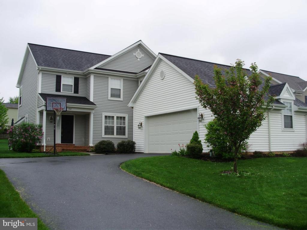 608 Wallingford Road Lititz, PA 17543 - Photo 1 of 30 a front view of a house with garden