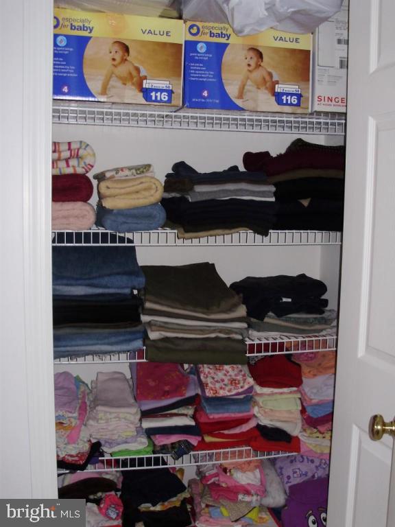 608 Wallingford Road Lititz, PA 17543 - Photo 14 of 30 a room with lots of different colored cloths