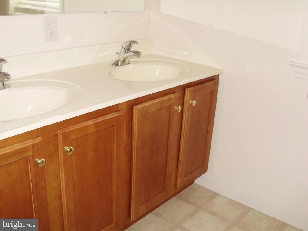 608 Wallingford Road Lititz, PA 17543 - Photo 17 of 30 a bathroom with a sink and vanity