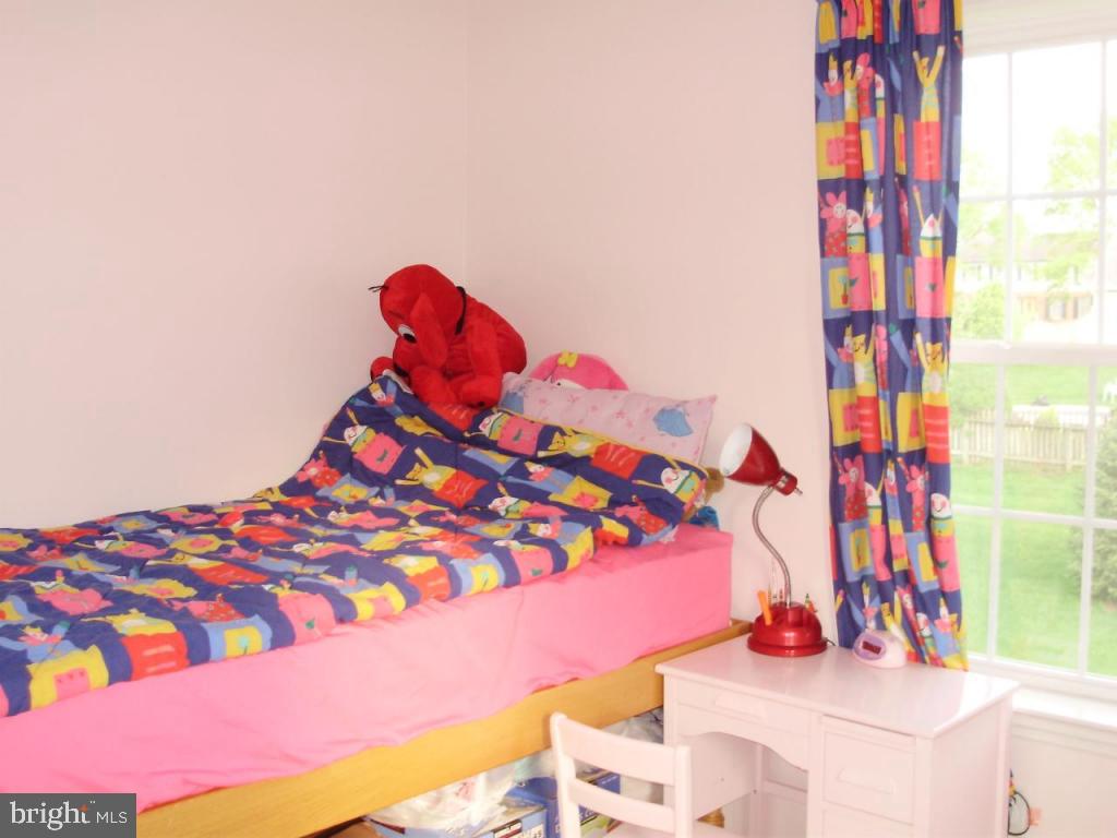 608 Wallingford Road Lititz, PA 17543 - Photo 18 of 30 a bedroom with a bed and a painting on the wall