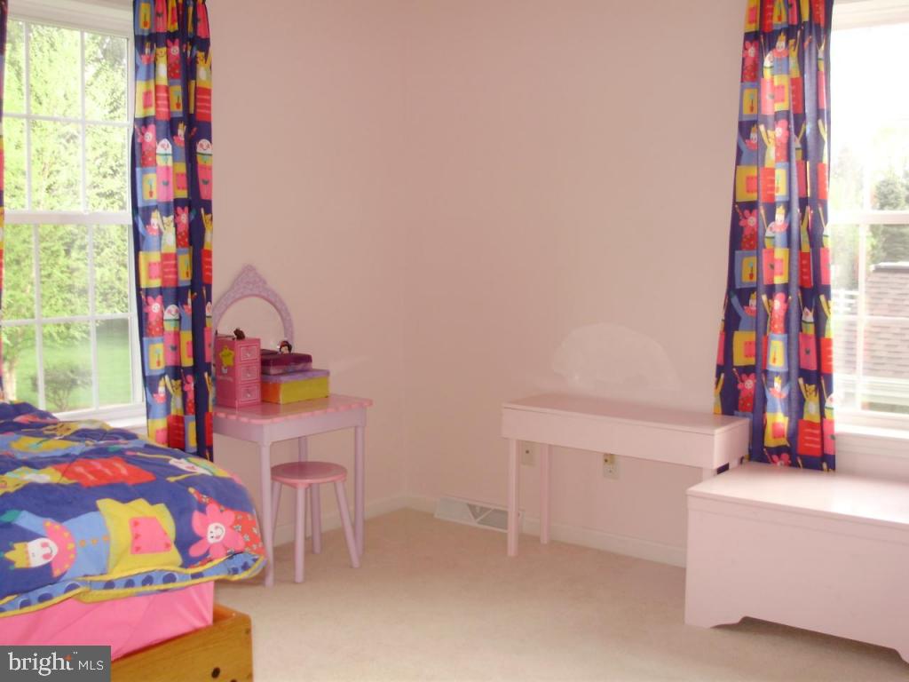 608 Wallingford Road Lititz, PA 17543 - Photo 19 of 30 a bedroom with a bed and a window