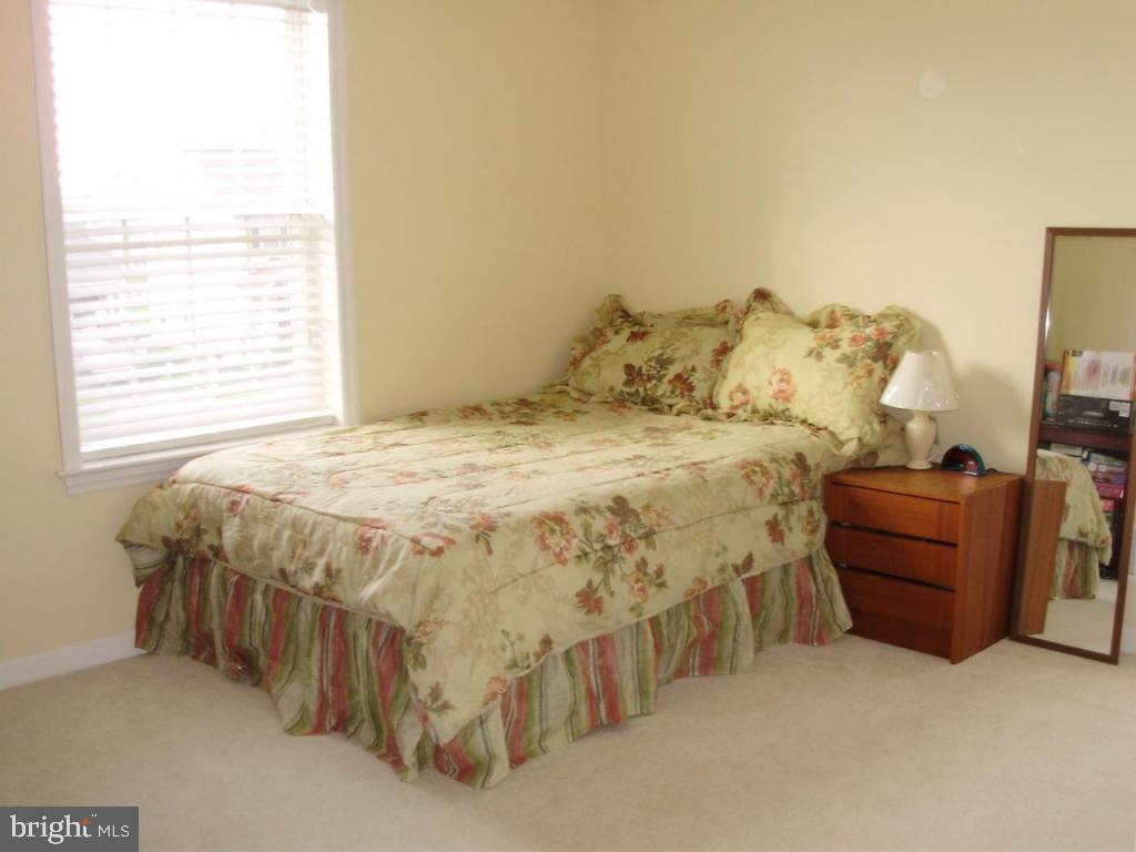 608 Wallingford Road Lititz, PA 17543 - Photo 22 of 30 a bed sitting in a bedroom next to a window