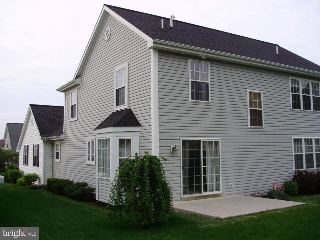 608 Wallingford Road Lititz, PA 17543 - Photo 25 of 30 a front view of a house with a yard and trees