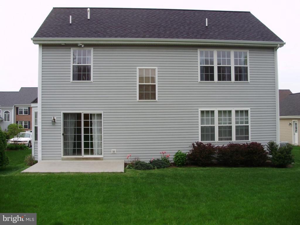 608 Wallingford Road Lititz, PA 17543 - Photo 26 of 30 a front view of a house with a garden