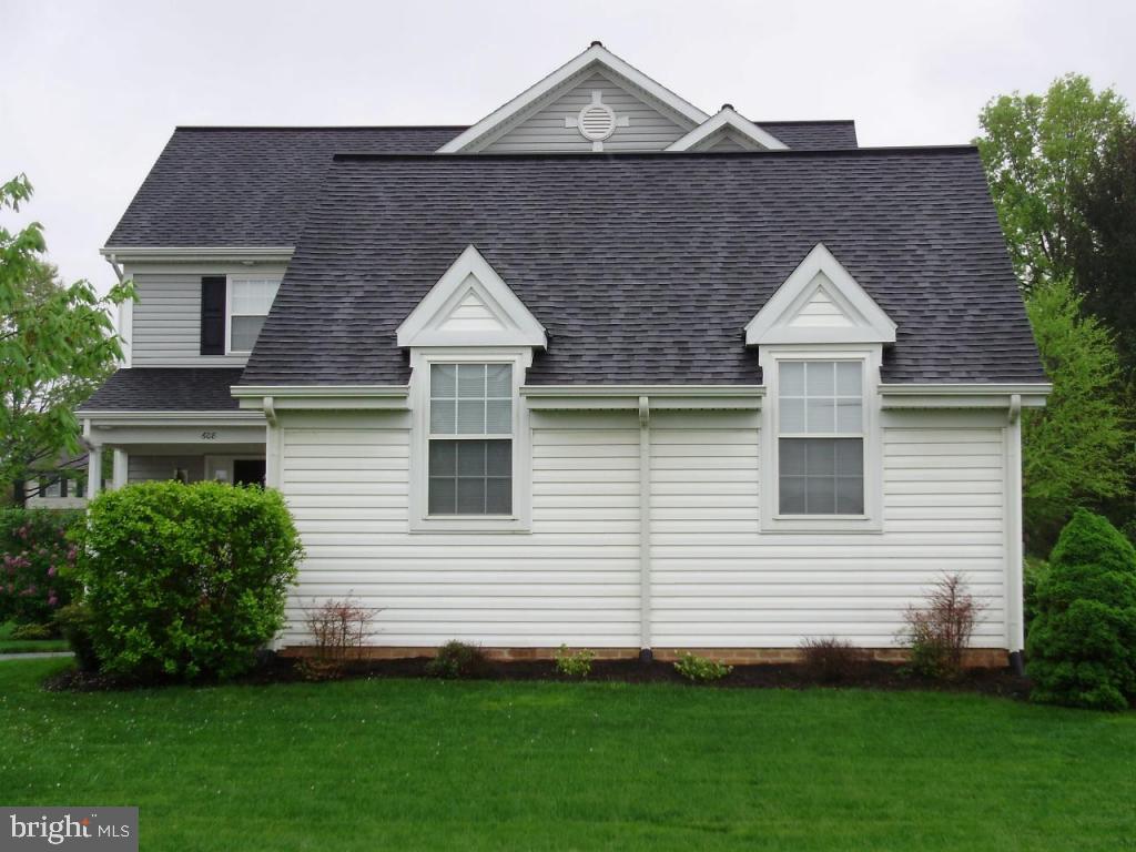 608 Wallingford Road Lititz, PA 17543 - Photo 28 of 30 a front view of a house with a garden