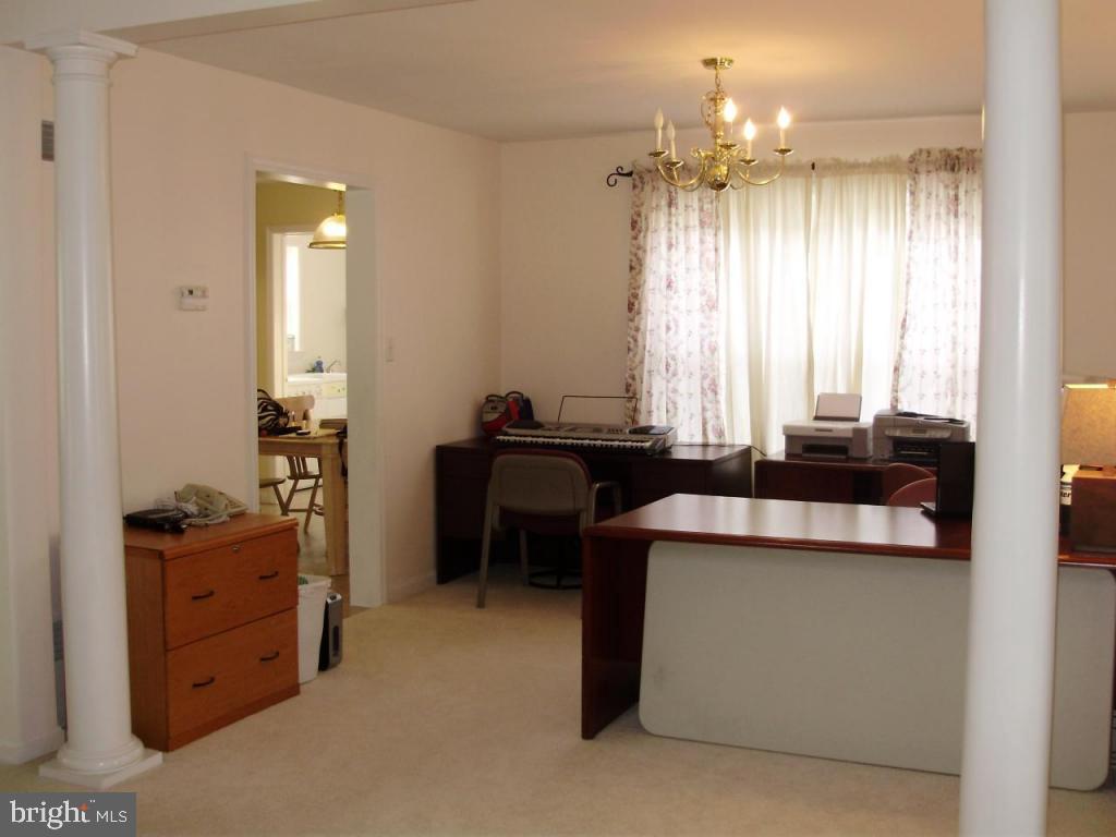 608 Wallingford Road Lititz, PA 17543 - Photo 4 of 30 a room with a cabinets and a dresser