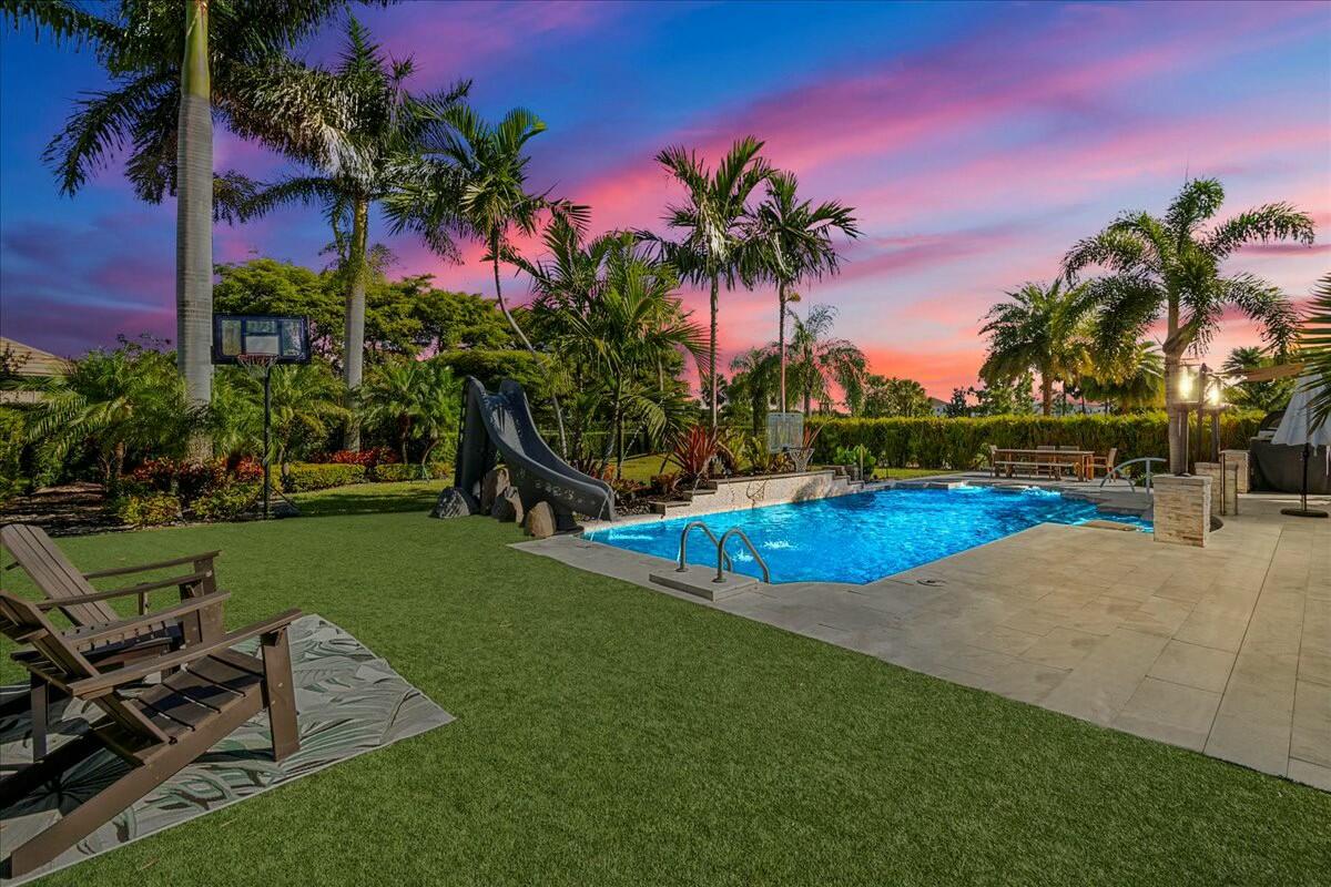 10895 Pisa Road Wellington, FL 33414 - Photo 30 of 50 backyard night