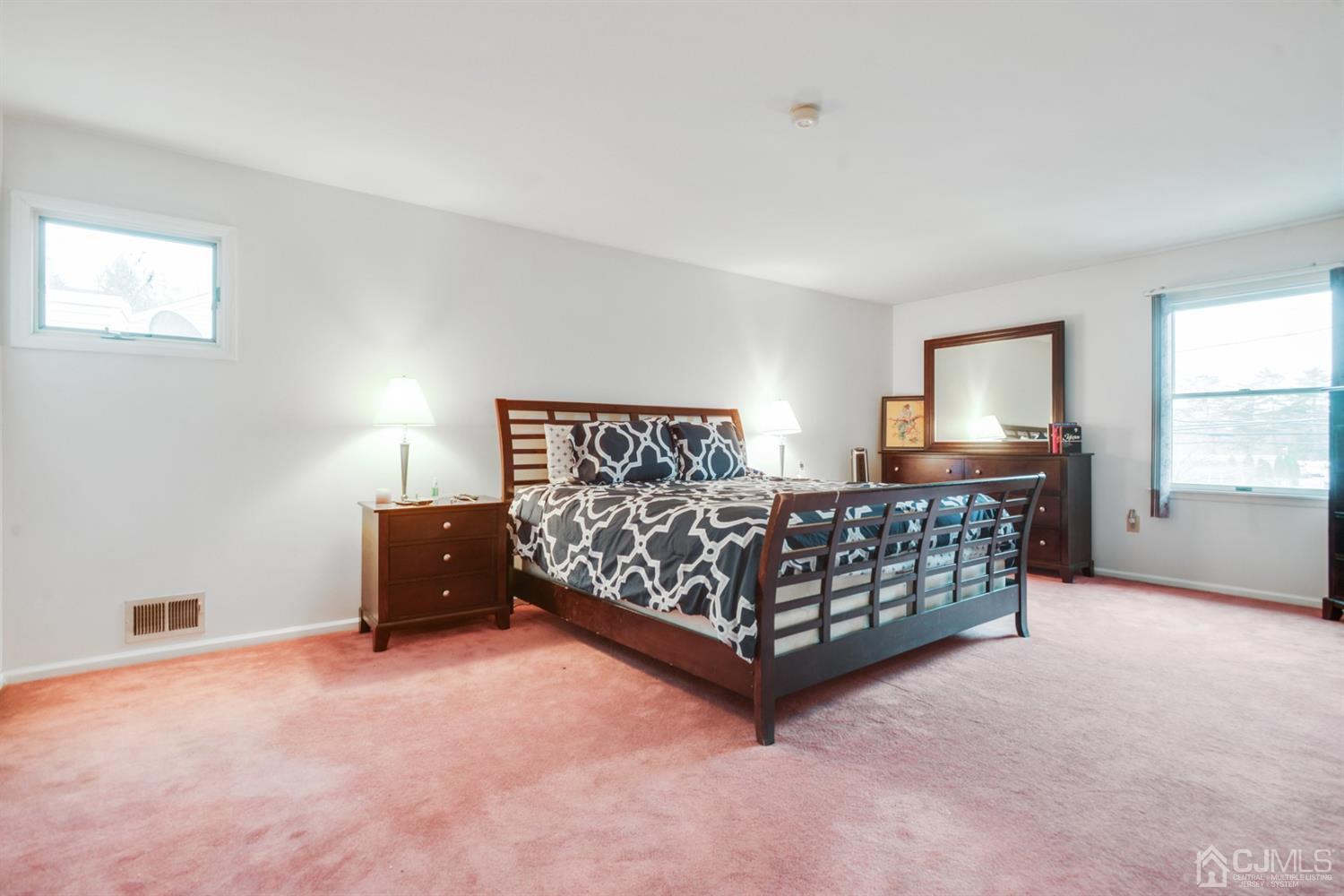 188 Plainfield Road Edison, NJ 08820 - Photo 9 of 16 a bedroom with a bed and window
