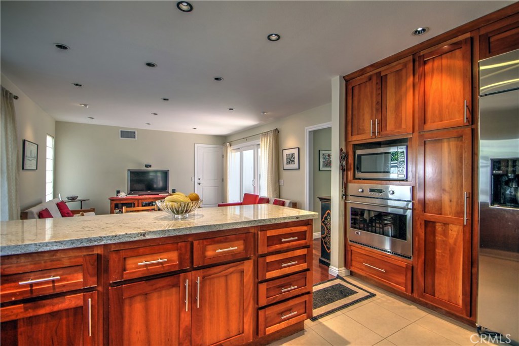 27 Silver Crescent Irvine, CA 92603 - Photo 13 of 30 a very nice looking kitchen with a large window