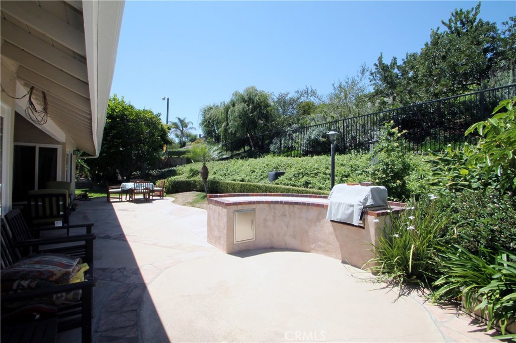 27 Silver Crescent Irvine, CA 92603 - Photo 25 of 30 a view of a swimming pool with a patio