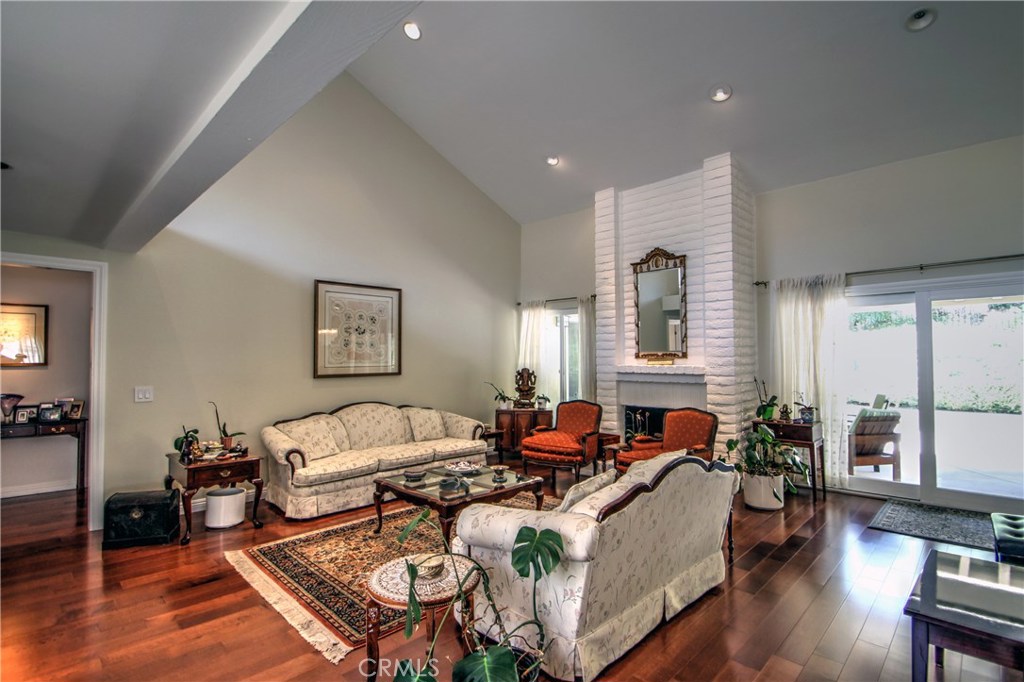 27 Silver Crescent Irvine, CA 92603 - Photo 5 of 30 a living room with furniture and a large window