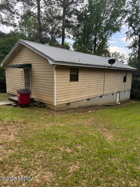 4819 Massey Road Macon, GA 31206 - Photo 11 of 11 a backyard of a house with seating space