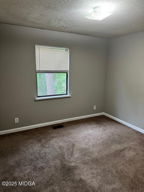 4819 Massey Road Macon, GA 31206 - Photo 5 of 11 an empty room with a window