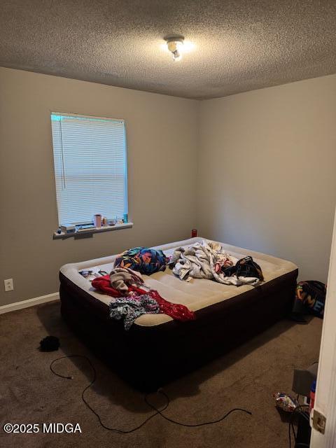 4819 Massey Road Macon, GA 31206 - Photo 7 of 11 a bedroom with a bed and window