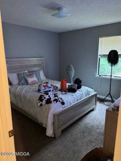 4819 Massey Road Macon, GA 31206 - Photo 8 of 11 a bedroom with a bed and a chair